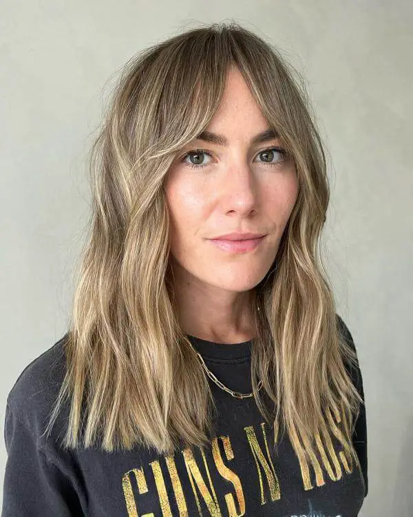 Medium Hairstyle With Curtain Bangs