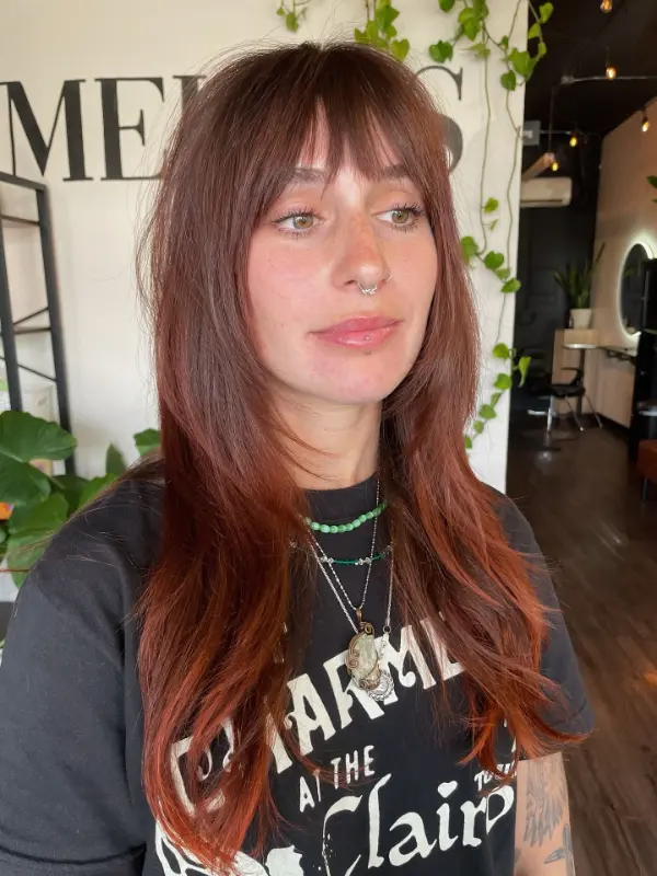 Butterfly Haircut with Wispy Bangs