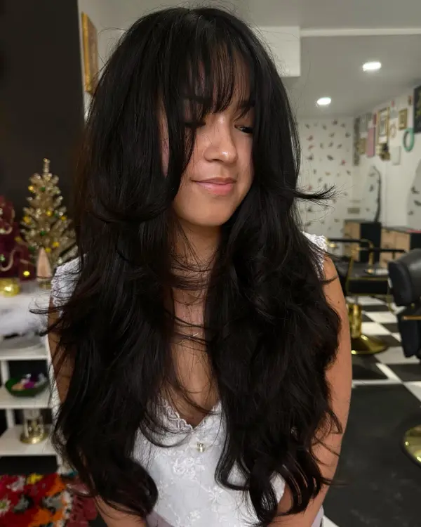 Long Butterfly Haircut with Bangs